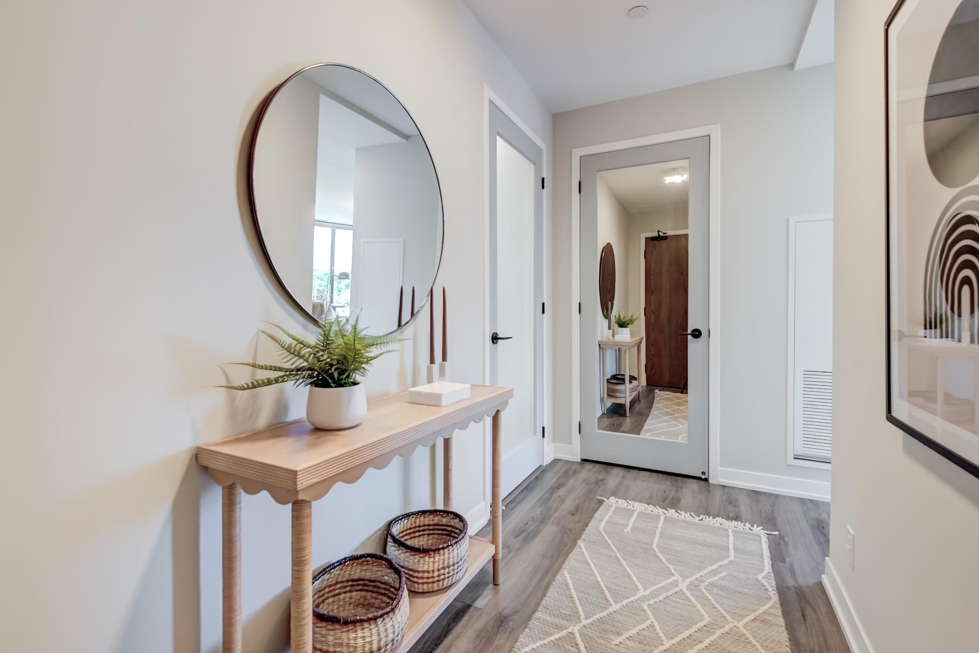 Entry hall with console, mirror and interior closets