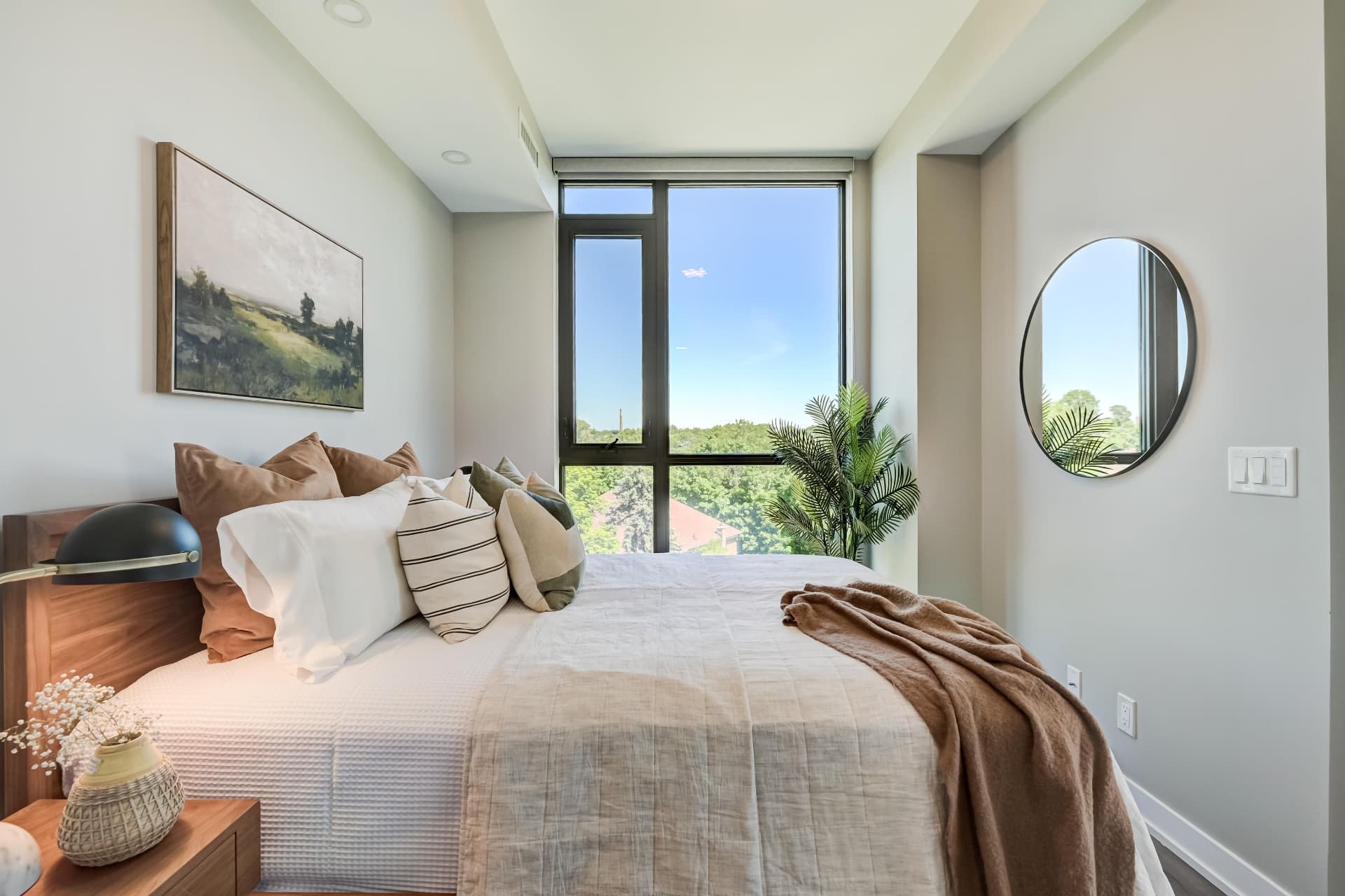 Primary bedroom retreat with corner windows and park outlook