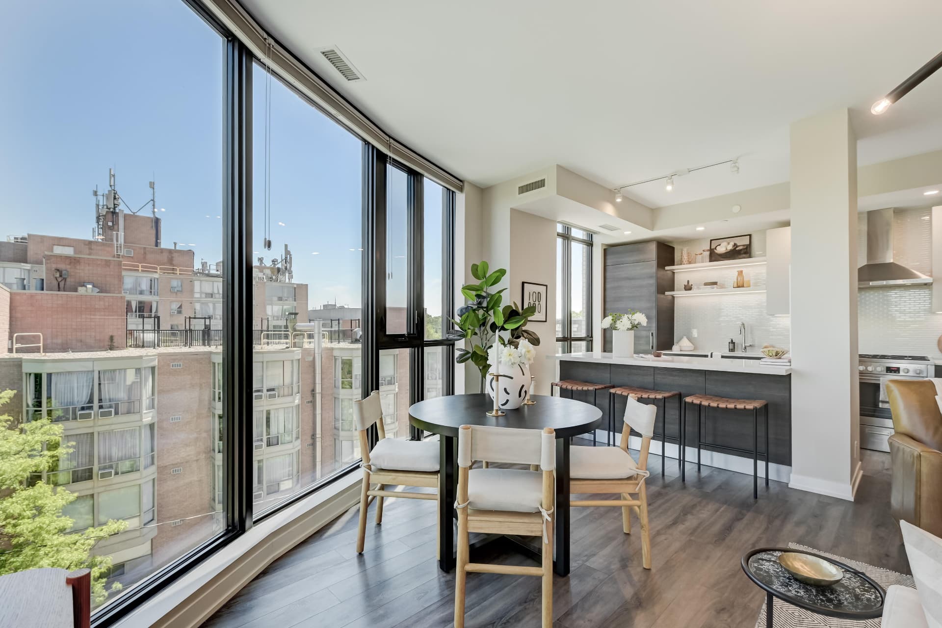 Dining nook beside the curved windows next to the kitchen