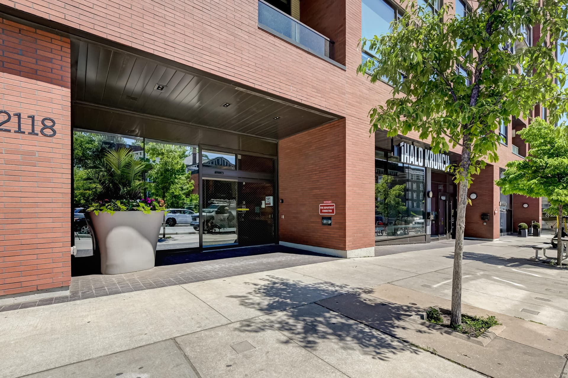 2118 Bloor Street West residential entrance and street-level shops